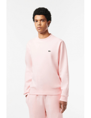 Sweat Lacoste rose Voir les baskets